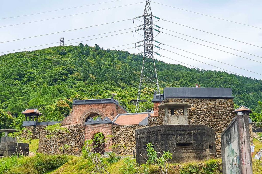 Renovated Hai Van Gate with New Buildings – The newly renovated Hai Van Gate, now featuring restored structures and additional buildings, blending history with modern touches.