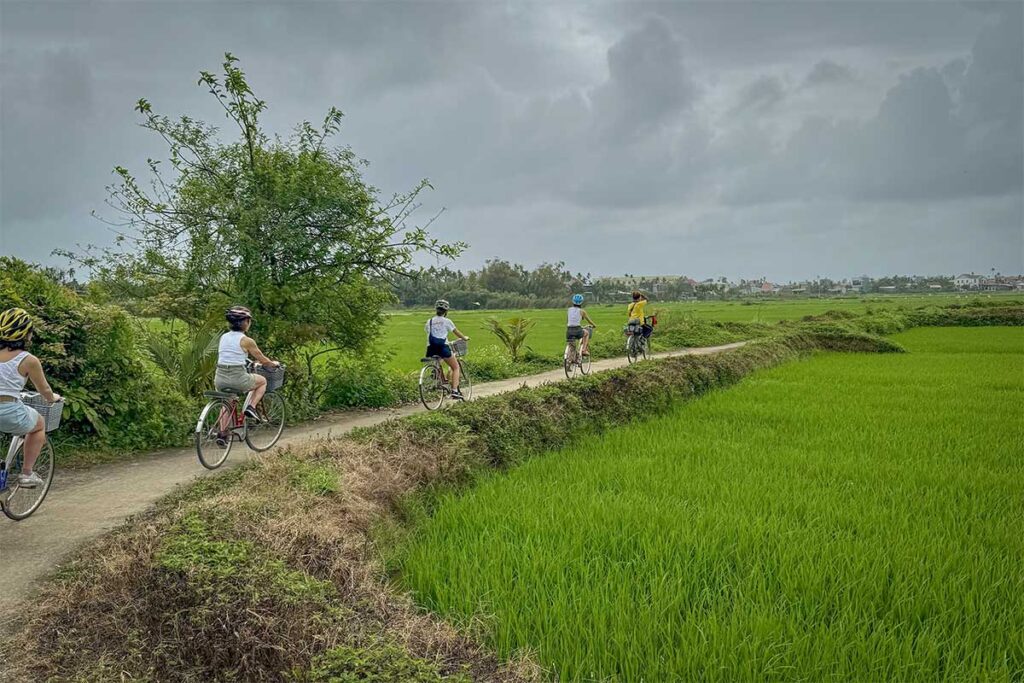 Cycling through Hoi An’s countryside to reach the cooking class venue