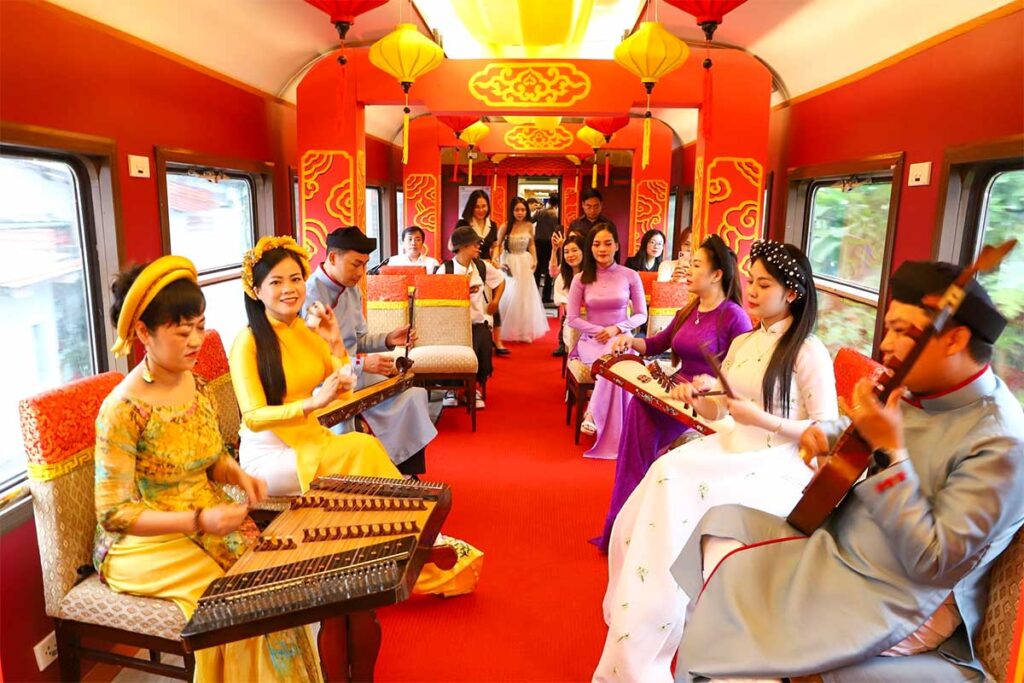 A traditional performance inside the Heritage Train running between Da Nang and Hue