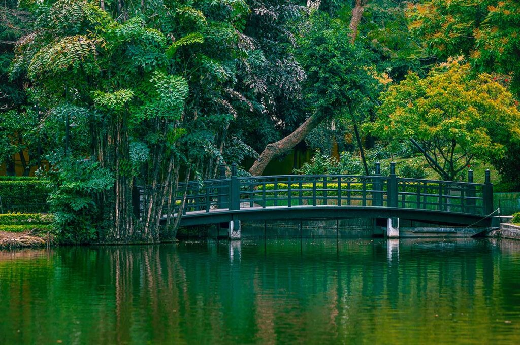 A footbridge inside the garden and park area of Ho Chi Minh’s Stilt House and Hanoi Presidential Palace