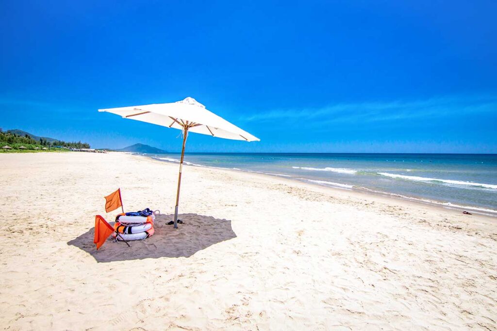 A sun umbrella on Lang Co Beach with white sand