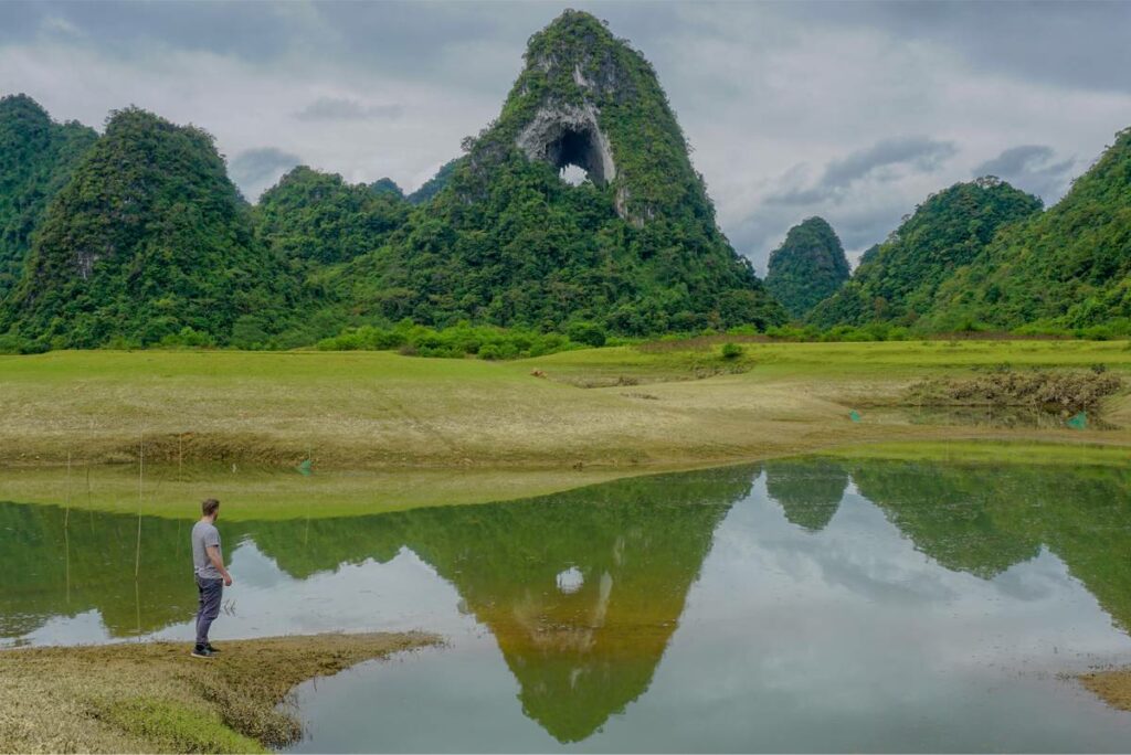 Nui Thung Mountain or Angel Eye Mountain located in Cao Bang is one of the most iconic mountains in Vietnam as it has a big opening that goes right through the top of the mountain