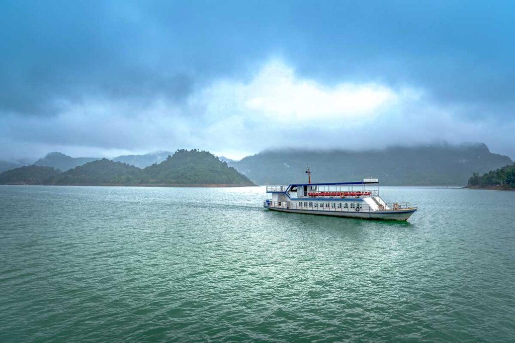 A boat on Hoa Binh Lake for tourists going around to see the lake