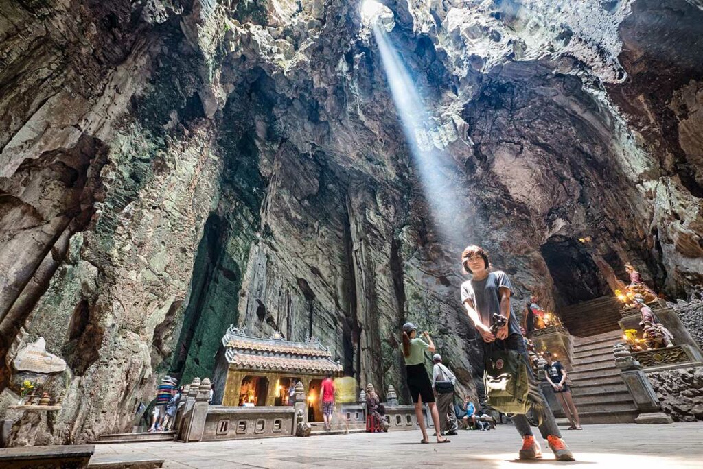 A cave with a temple inside the Marble Mountains near Da Nang - Vietnam