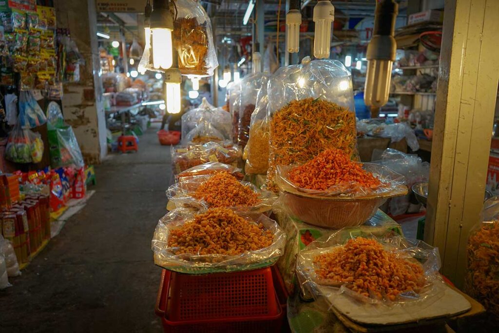 Dried shrimp on display at Ben Tre Market – Local produce and seafood stalls inside a traditional Vietnamese market.