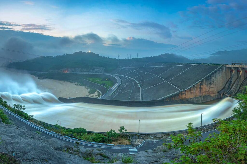 Hoa Binh Hydropower Plant with overflow gates open and lots of water