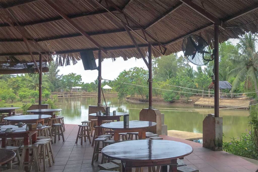 Open-air riverside restaurant inside Vam Ho Bird Sanctuary, Ben Tre