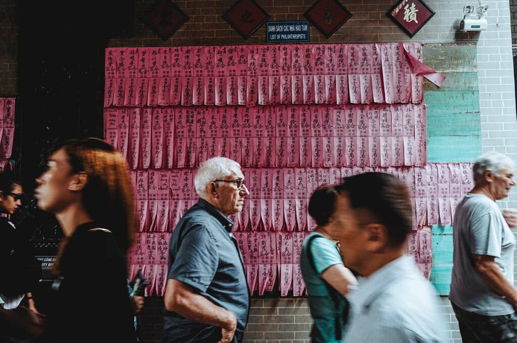 tourists visiting a temple in Vietnam