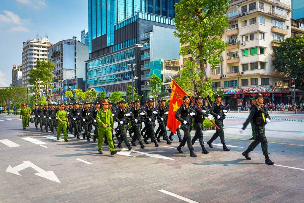 Parade of army in Vietnam during Reunification Day celebrations