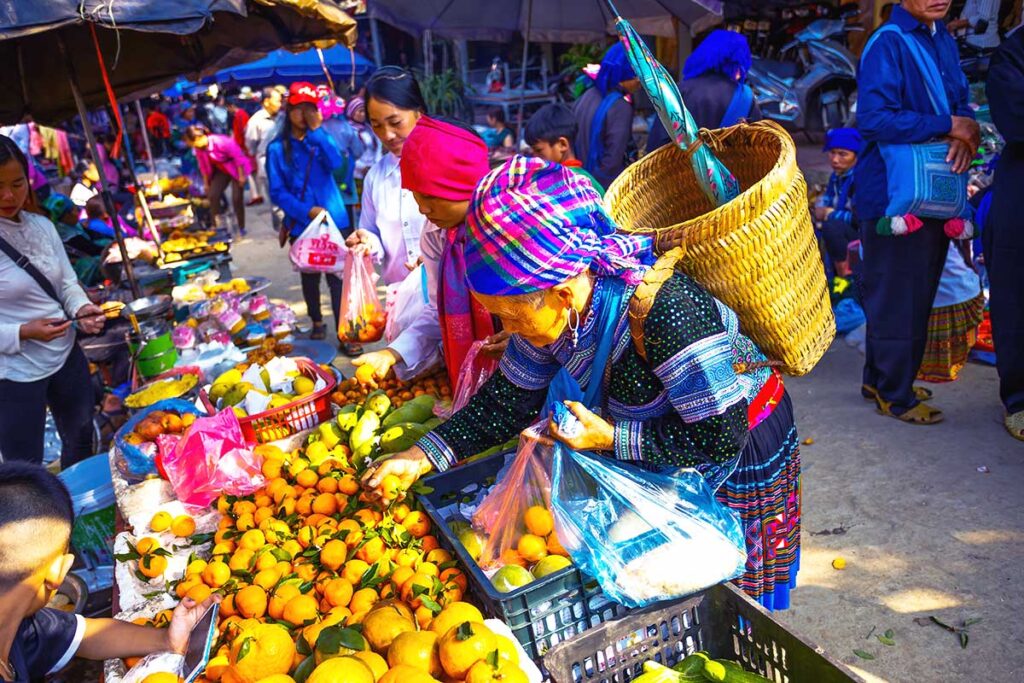 minority woman shopping at Muong Hum Market