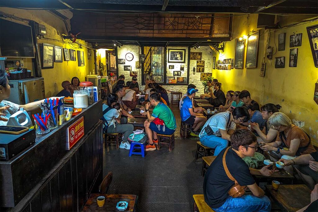 Cafe Dinh: Hanoi's Egg Coffee Origin: The simple, authentic interior of Cafe Dinh, home of the original egg coffee and a beloved Instagrammable spot in Hanoi.