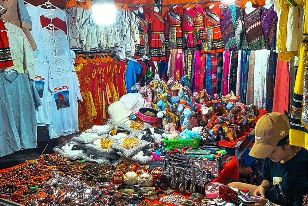 lot of souvenirs are being sold at this stall at the Sapa Night Market