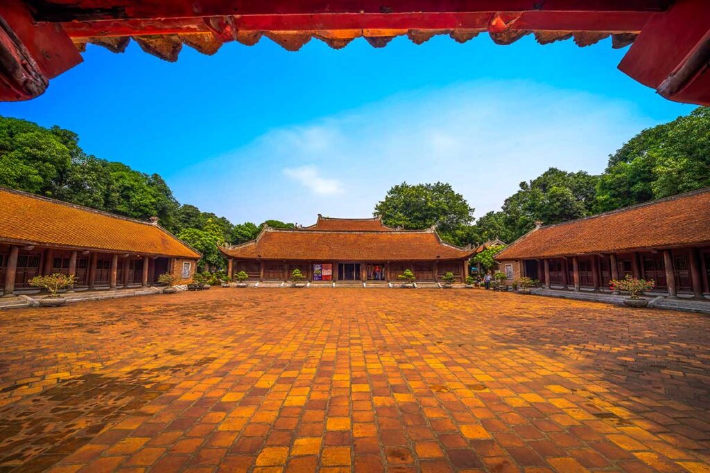 Temple of Literature Courtyard: A central courtyard surrounded by elegant temple buildings at the Temple of Literature in Hanoi.