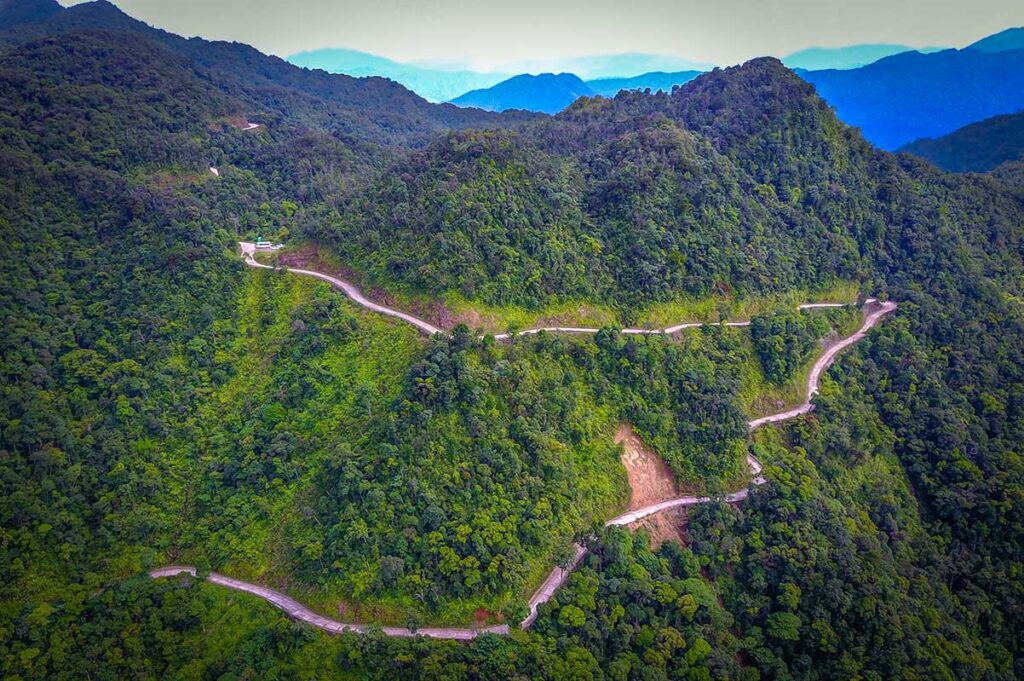 A road going very steep to the top of Bach Ma Mountain in Bach Ma National Park - One of Vietnam's most stunning mountain regions