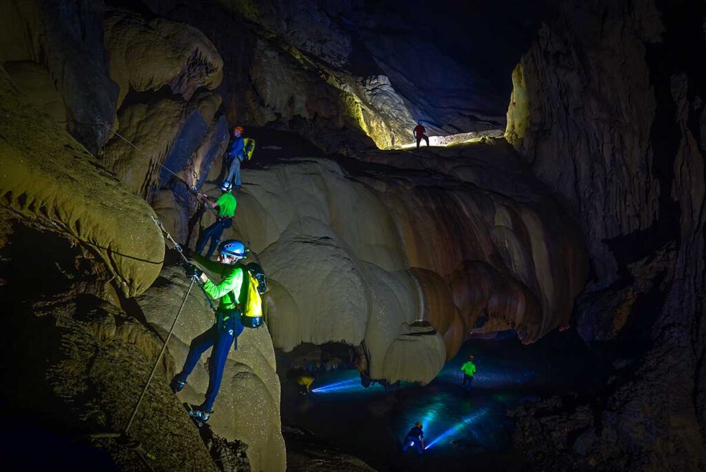 Abseiling inside Hang Va Cave