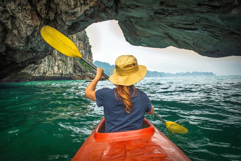 Kayaking through a cave in Lan Ha Bay at Cat Ba Island