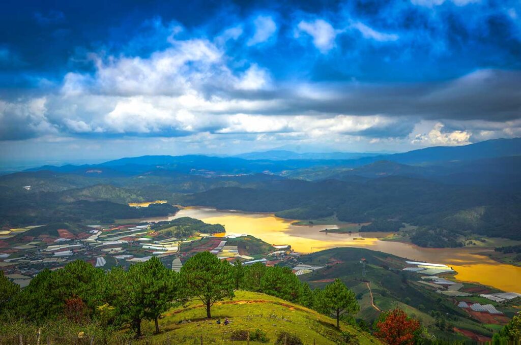 Amazing view from the viewpoint on top of Lang Biang Mountain over a lake, rivers, mountains and forests.