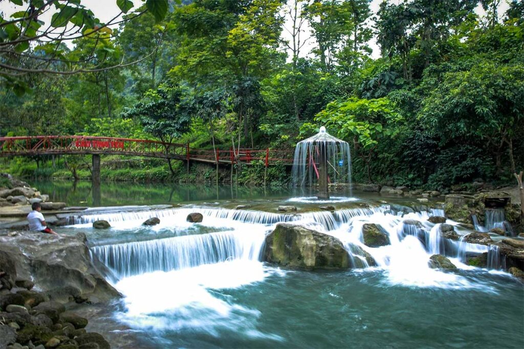 A small waterfall and stream for swimming at Mam Stream in Bac Son Valley