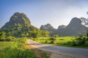 A road through mountain landscape part of Non Nuoc Cao Bang UNESCO Global GeoparkNon Nuoc