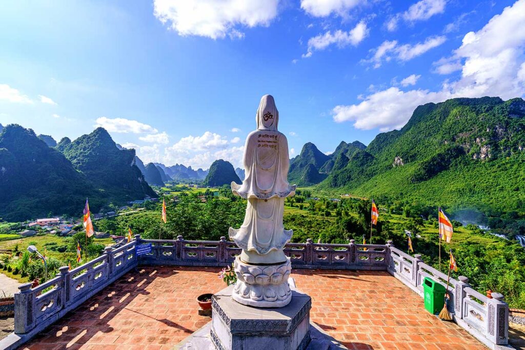 A statue located on the hill top of Phat Tich Truc Lam Ban Gioc Pagoda with amazing views over the surrounding mountains of Cao Bang