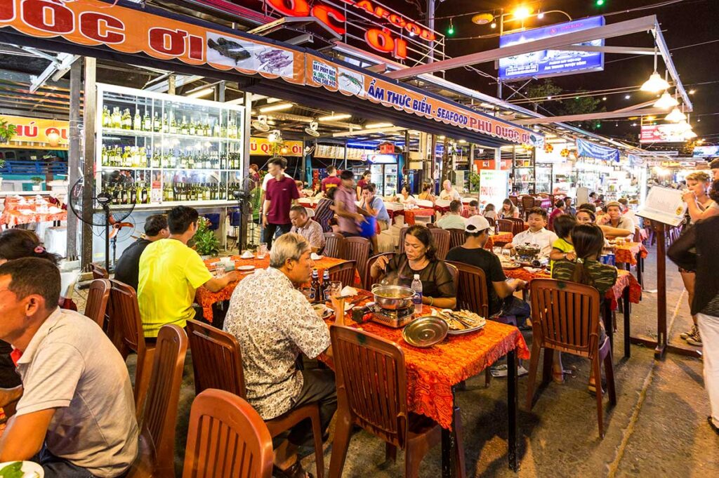 People eating seafood at the Phu Quoc Night Market