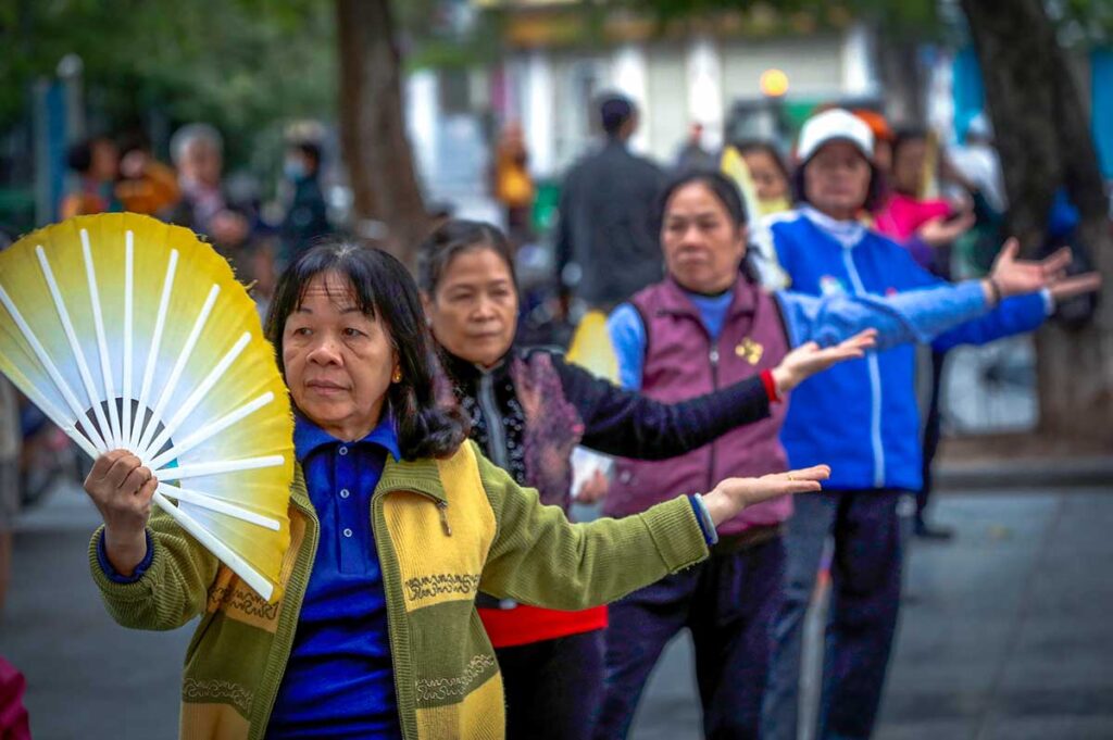 locals practicing Tai Chi in Hanoi