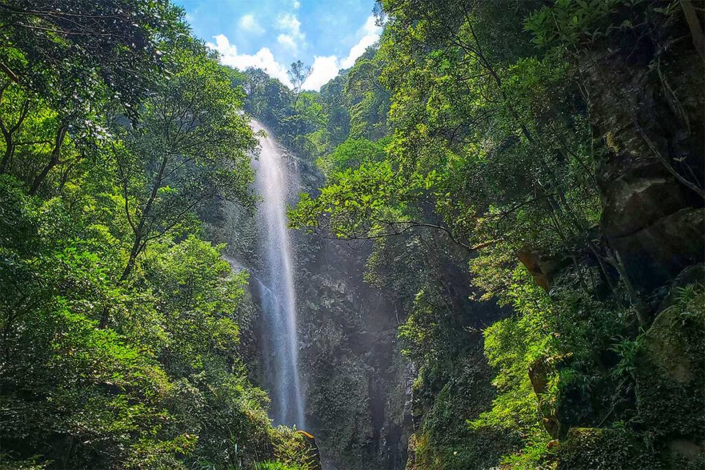 The hidden Thac Bay Beng Diu Waterfall surrounded with mountains and jungles at Mau Son Mountain in Lang Son