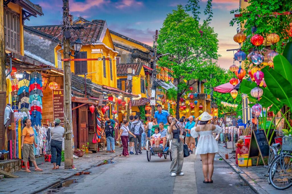 Lantern-filled streets and yellow heritage houses in Hoi An Ancient Town – one of the best things to do in Vietnam.