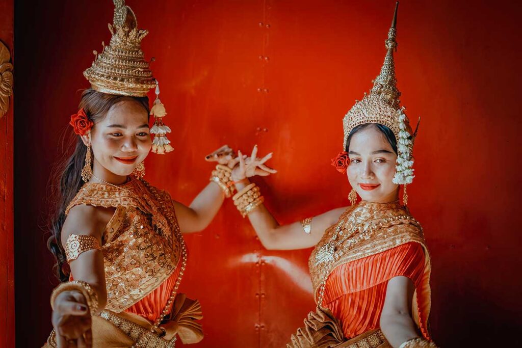 Khmer Apsara dancers in traditional costume performing at a pagoda during the Ok Om Bok Festival in the Mekong Delta, showcasing Khmer culture in southern Vietnam