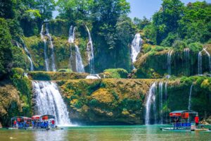 Ban Gioc Waterfall in April – Water levels are gradually increasing at Ban Gioc Waterfall in April, with more streams flowing over the tiers, hinting at the stronger flow to come.