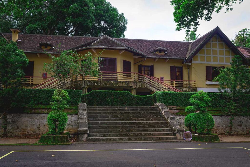 The historic facade of Bao Dai's Palace, reflecting its colonial architectural design.