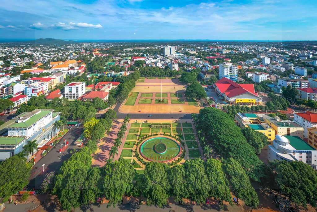 An aerial photograph capturing the expansive Buon Ma Thuot Square, highlighting its layout and surrounding structures.