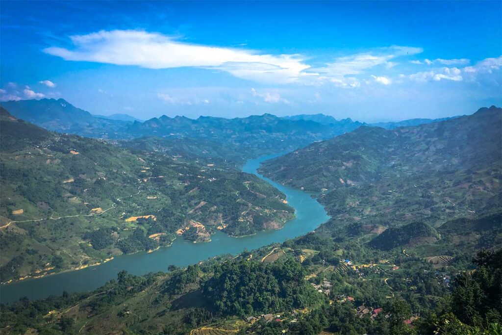 A view from high up over the mountains and deep down the Chay River in Bac Ha District