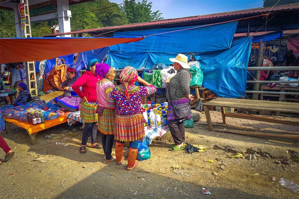 Group of ethnic woman are talking to each other on the Lung Phin Market