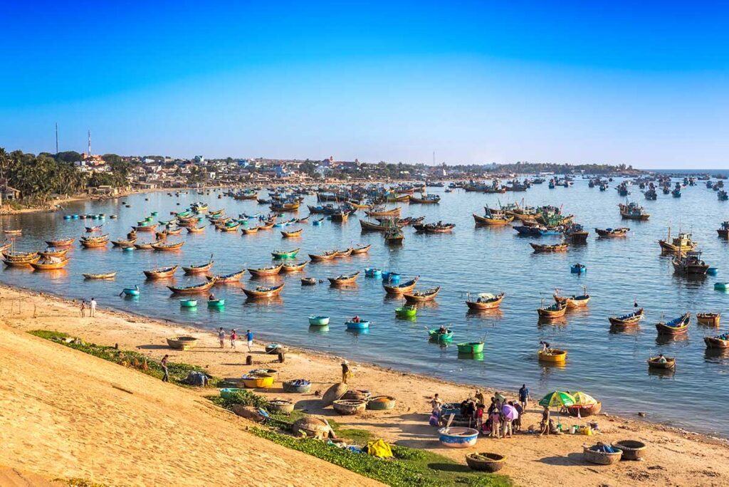 Mui Ne fishing harbour with lots of fishing boats 