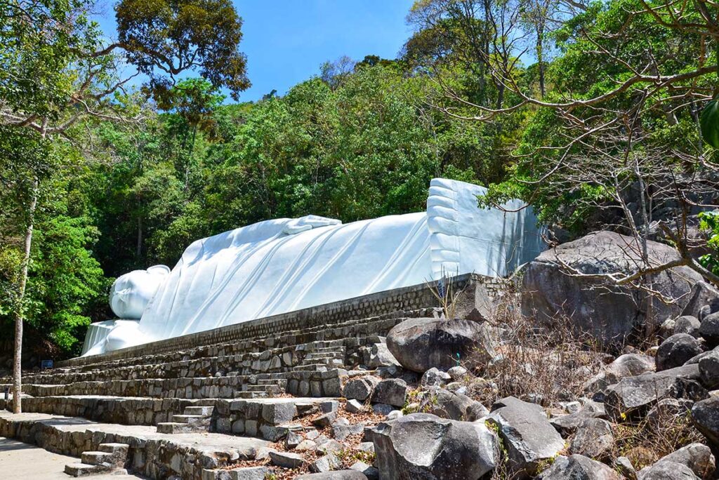 A tall white reclining Buddha at Ta Cu Mountain