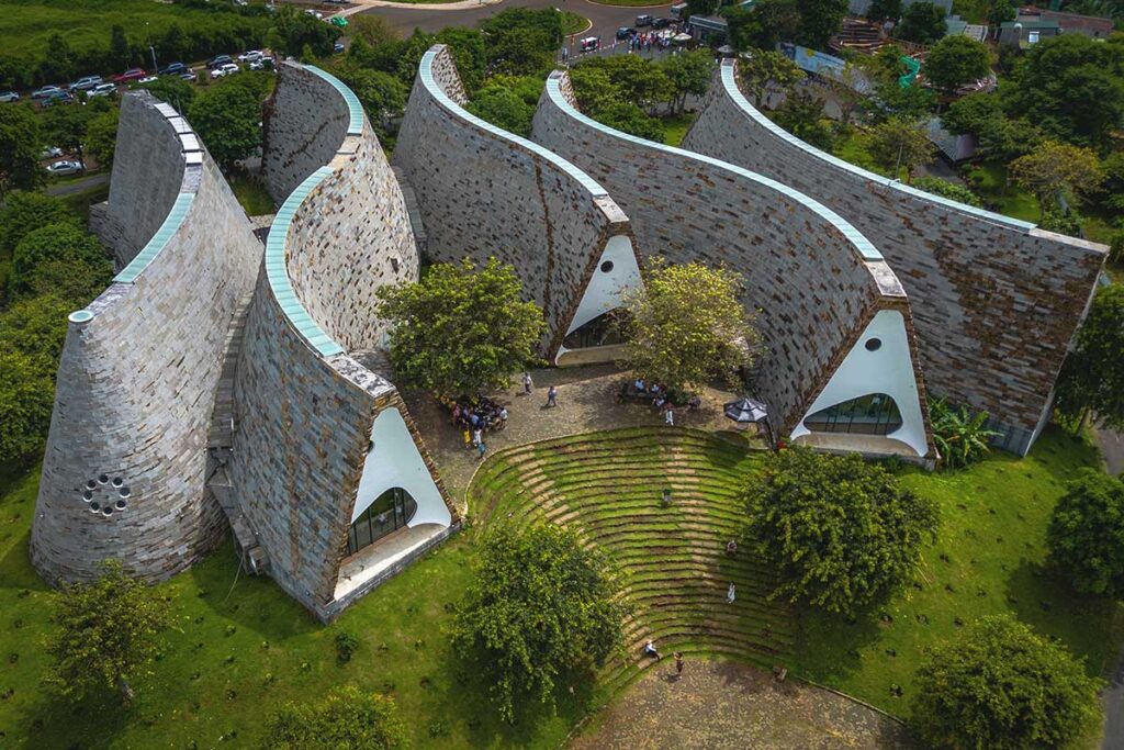 An aerial photograph of The World Coffee Museum, showcasing its unique architectural design.