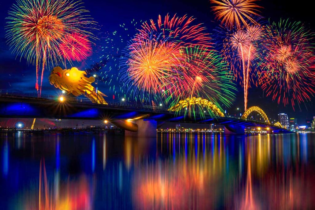 Da Nang in January – A spectacular fireworks display over Dragon Bridge during Tet New Year, lighting up the night sky above the Han River.