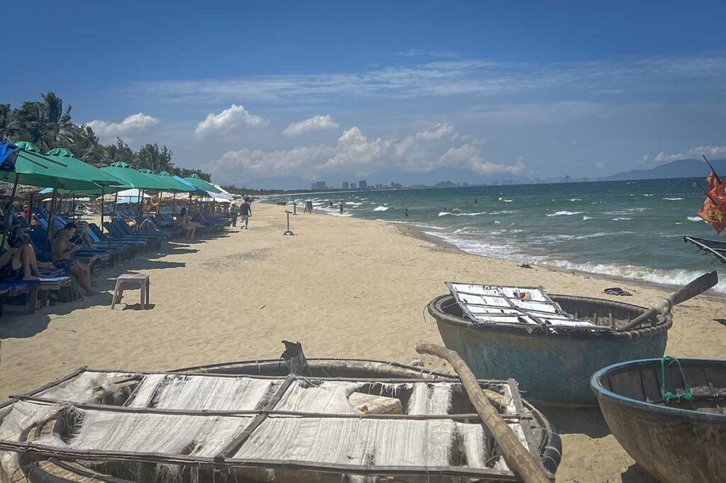 Visitors relaxing on Hoi An’s beach in September, enjoying breezy conditions and fewer crowds as the wet season gradually approaches central Vietnam.