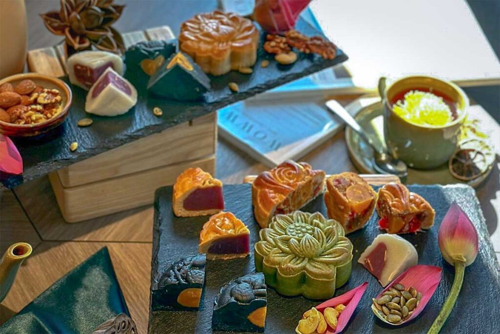 Different tastes of mooncakes served at a coffee shop in Hanoi during Mid Autumn Festival