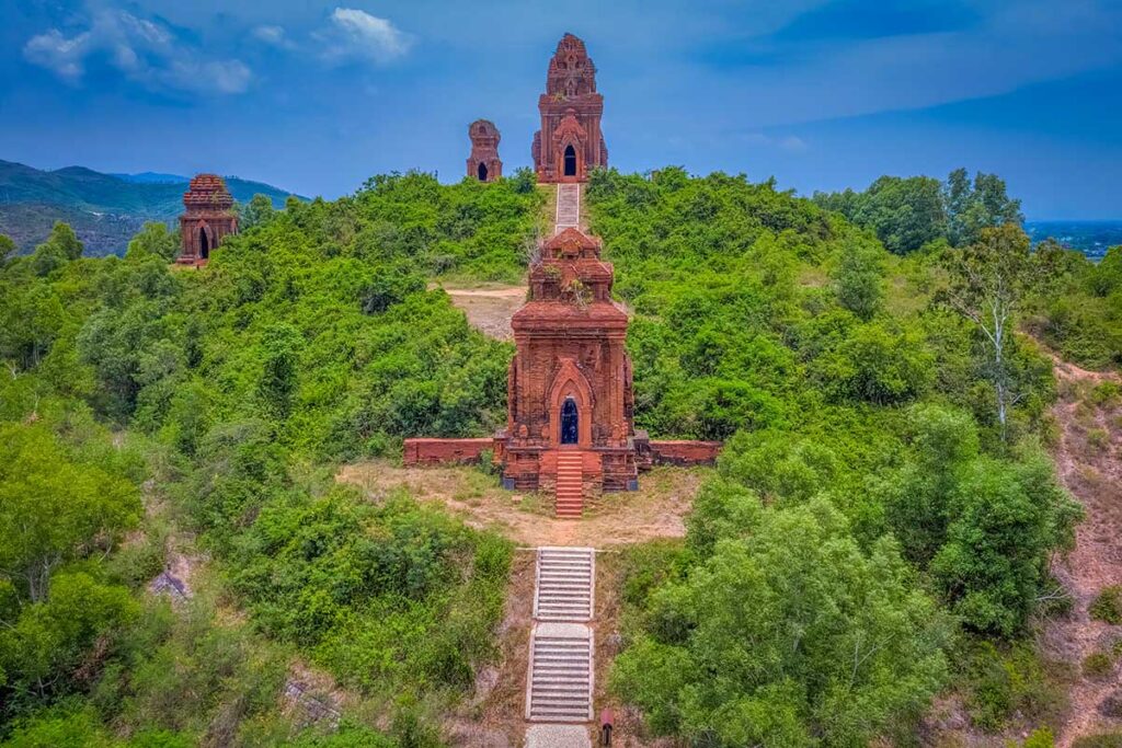 Processional axis at Banh It Cham Towers, stairways linking Gopura, Posah, and the hilltop Kalan.