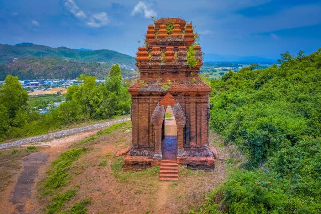 Posah (Stele) Tower at Banh It Cham Towers, square plan with arched openings above the plain.
