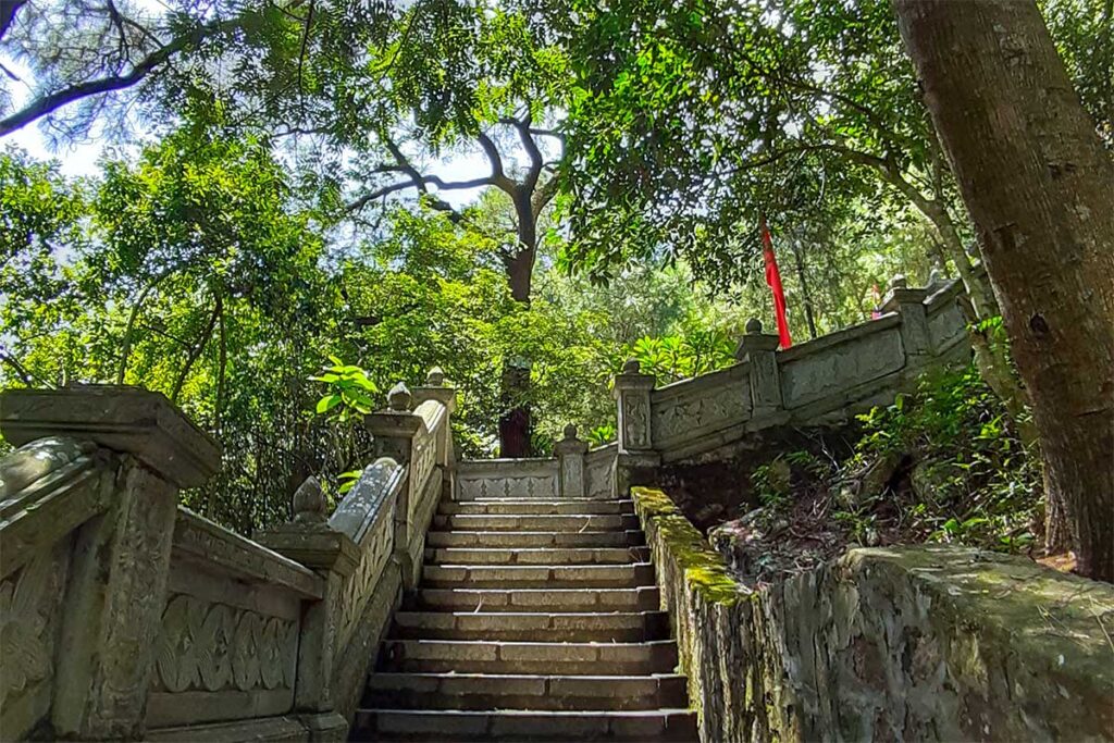 Stairs leading up Con Son Mountain through forest