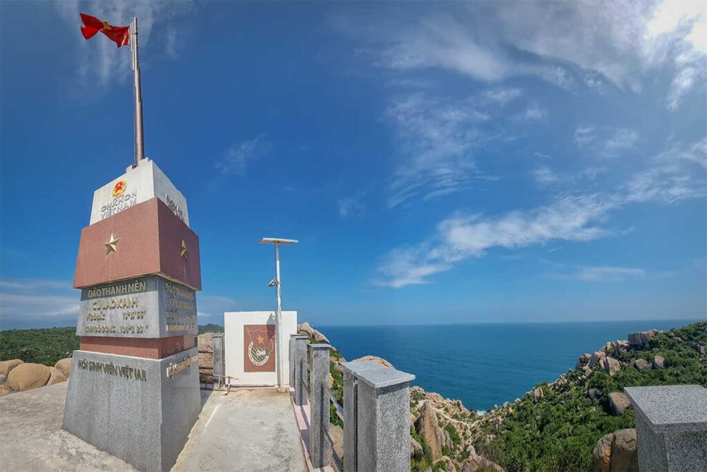 Vietnamese sovereignty flagpole monument on Cu Lao Xanh Island overlooking the East Sea.