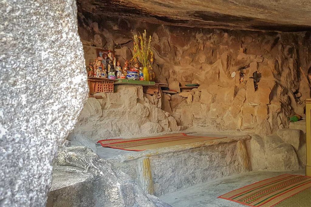 To Cave at Ong Nui Temple, where monk Le Ban once meditated, now with a small altar inside.