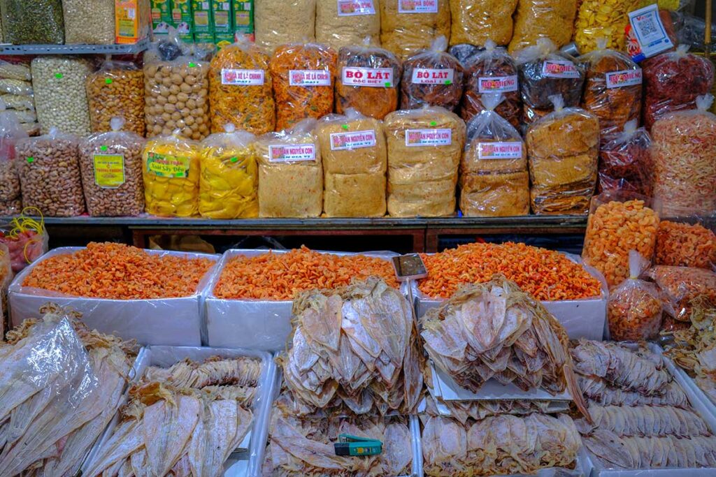 Dried fruit and squid on a market stall in Dong Ba Market