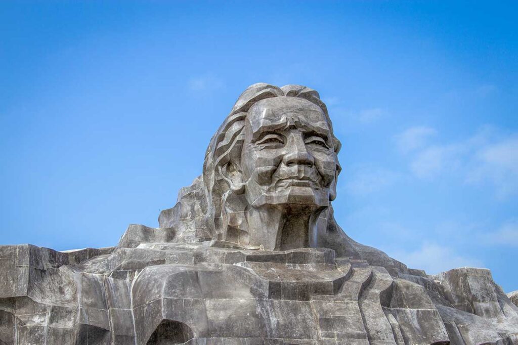 Close-up of the giant stone face of Heroic Mother Thu Statue in Quang Nam, Vietnam.