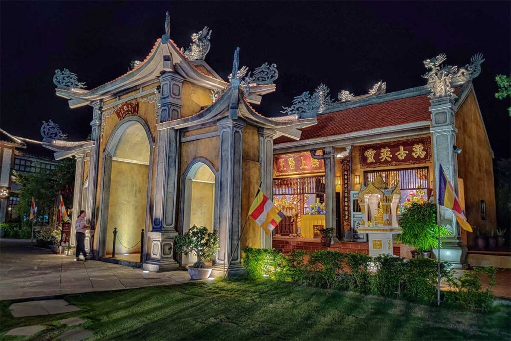 Night view of Hoi An Memories Land with traditional-style buildings and lively atmosphere