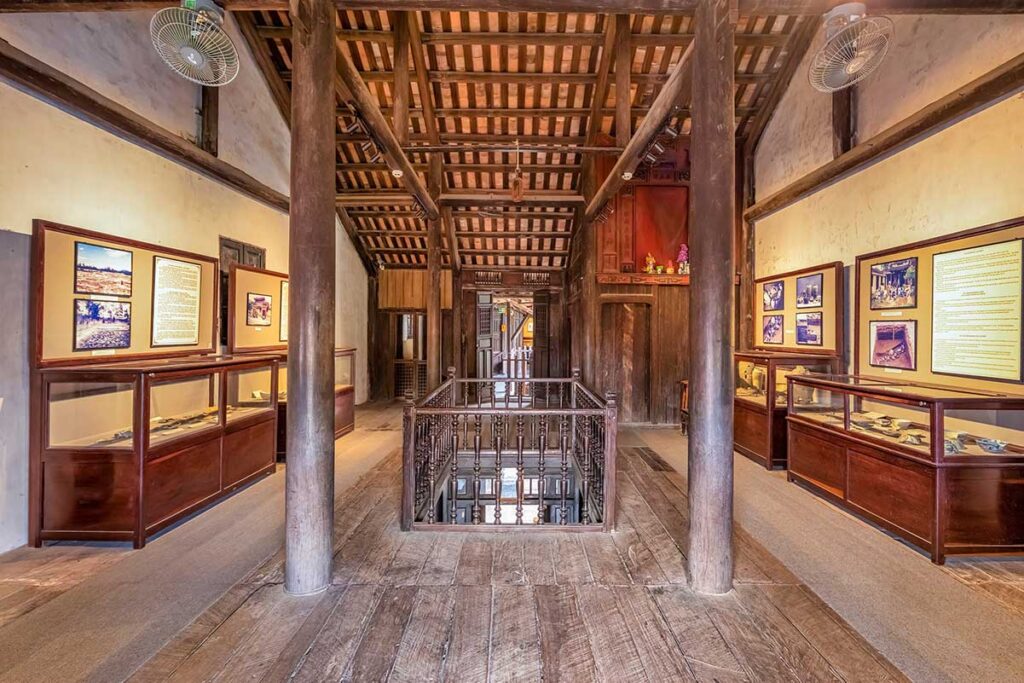 Interior of Hoi An Museum of Trade Ceramics with wooden architecture and historical exhibits