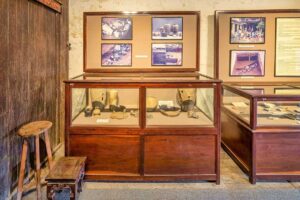Exhibition of ancient pottery artifacts at Hoi An Museum of Trade Ceramics, with displays of excavated ceramics